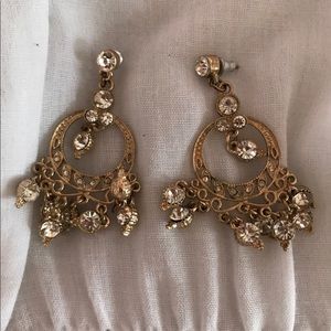 Gold with gems dangly earrings
